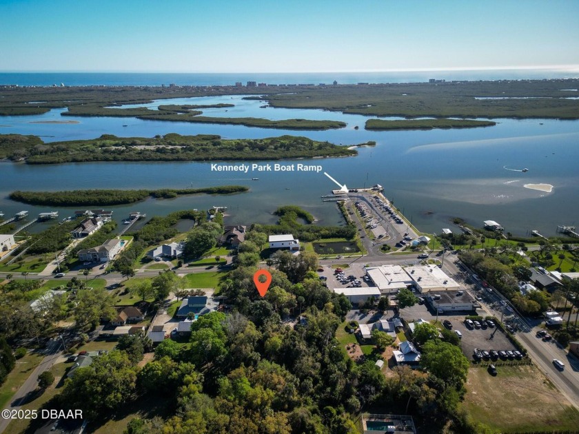 Looking for a large parcel with river views?  This deep and wide - Beach Lot for sale in Edgewater, Florida on Beachhouse.com