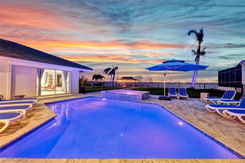 Gorgeous RIVERFRONT POOL home with EXPANSIVE views of the - Beach Home for sale in Cape Coral, Florida on Beachhouse.com