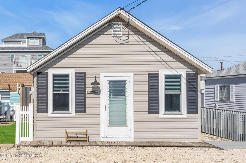 Step into this coastal retreat where the nostalgia of beachside - Beach Home for sale in Seaside Park, New Jersey on Beachhouse.com
