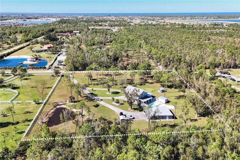 Wow! One kind of an estate on 2.66 acres with 2 homes and a - Beach Home for sale in Cape Coral, Florida on Beachhouse.com