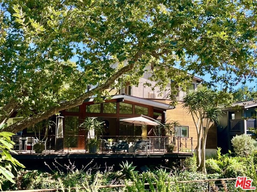 Mid-Century Modern Retreat tucked behind lush landscaping and - Beach Home for sale in Santa Barbara, California on Beachhouse.com