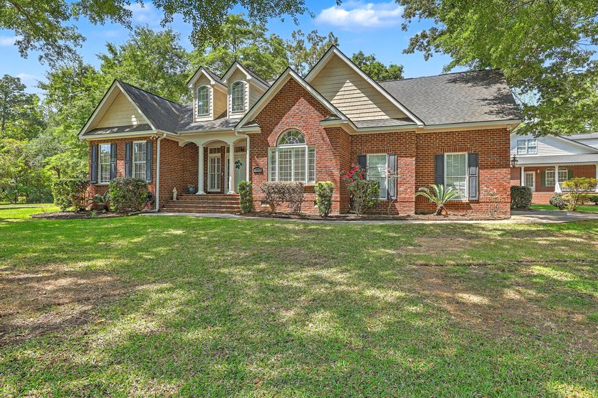 This custom-built, solid brick home in the prestigious Coosaw - Beach Home for sale in North Charleston, South Carolina on Beachhouse.com