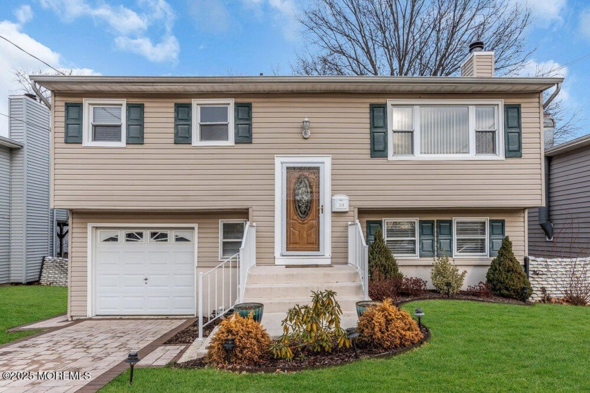 This Bi-level home offers water views of the bay and includes 3 - Beach Home for sale in Keyport, New Jersey on Beachhouse.com