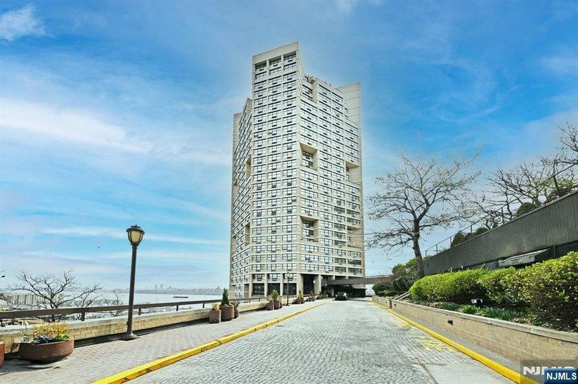 Experience luxury high-rise living where serenity meets - Beach Condo for sale in Guttenberg, New Jersey on Beachhouse.com
