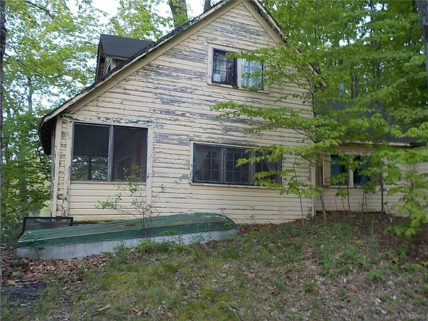 Cottage itself needs extensive rehab or demolition. Fantastic - Beach Home for sale in Pulaski, New York on Beachhouse.com