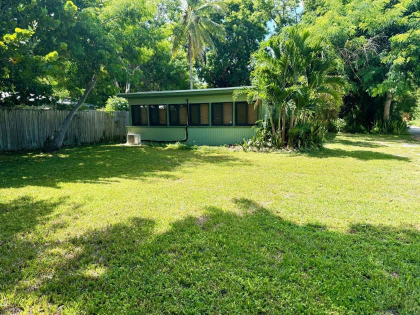 The quintessential Keys cottage style home is awaiting you, to - Beach Home for sale in Key Largo, Florida on Beachhouse.com