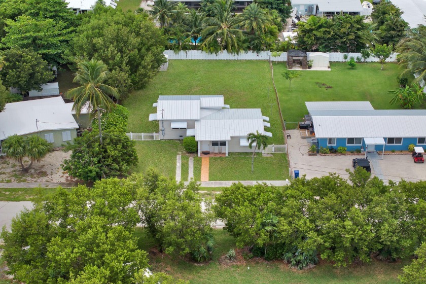 CHARMING FAMILY HOME ON A HUGE FENCED LOT in a wonderful family - Beach Home for sale in Marathon, Florida on Beachhouse.com