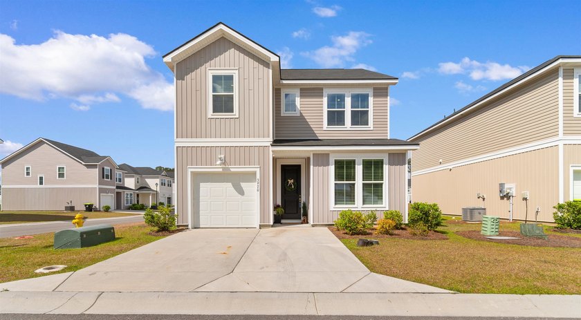 This beautifully designed two-story home offers a modern - Beach Home for sale in Little River, South Carolina on Beachhouse.com
