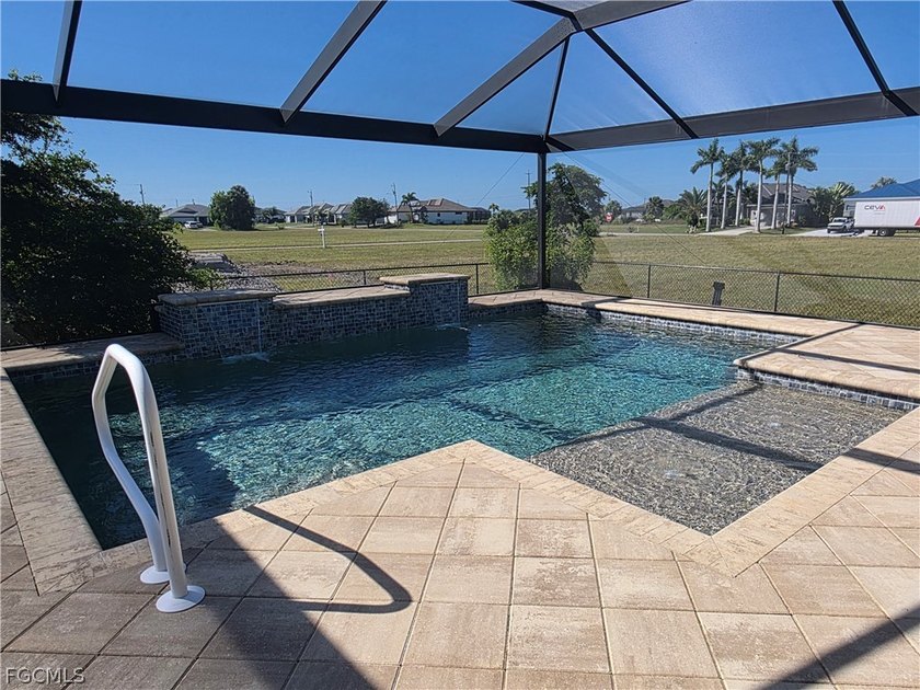 Splish and splash in this stunning saltwater swimming pool with - Beach Home for sale in Cape Coral, Florida on Beachhouse.com