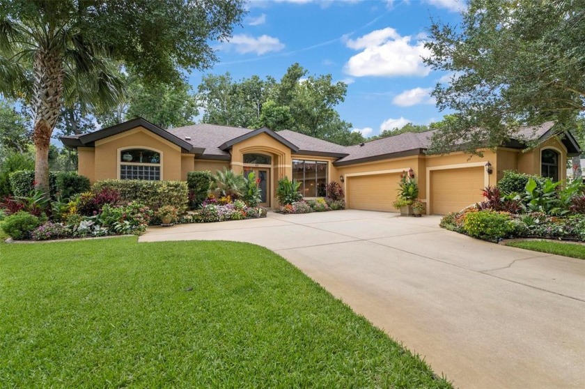 You'll be amazed by the beautifully landscaped front garden - Beach Home for sale in Palm Coast, Florida on Beachhouse.com