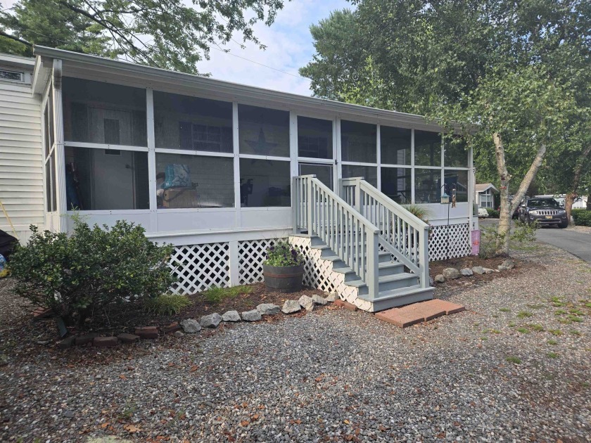 SEASONAL MANUFACTURED HOME ON A NICE CORNER LOT less than a mile - Beach Home for sale in Seabrook, New Hampshire on Beachhouse.com