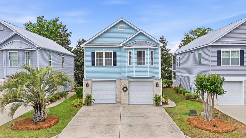 Welcome to this beautifully maintained 4-bedroom, 3-bath raised - Beach Home for sale in North Myrtle Beach, South Carolina on Beachhouse.com