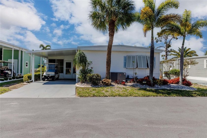 Experience the pinnacle of Florida living in this masterfully - Beach Home for sale in Port Charlotte, Florida on Beachhouse.com
