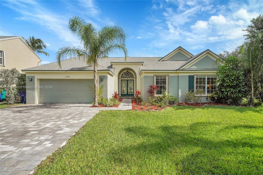 Welcome to your dream home sitting on an oversized lot! This - Beach Home for sale in Cooper City, Florida on Beachhouse.com