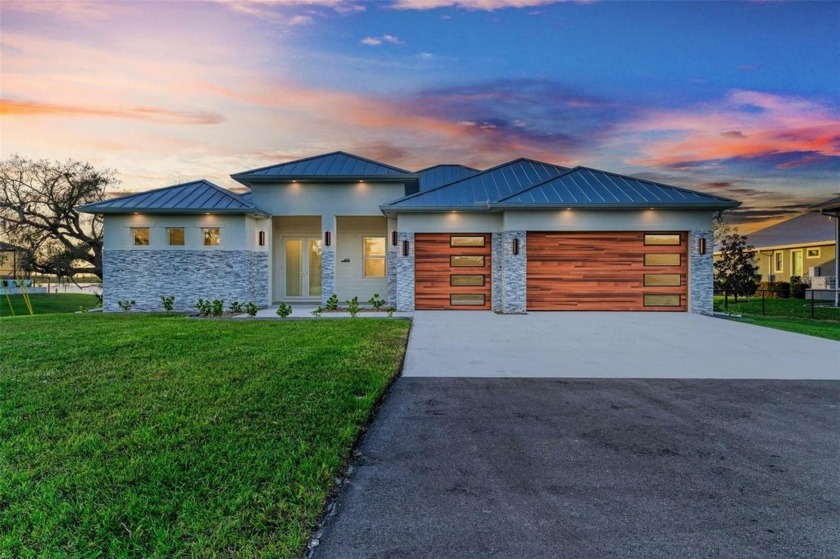 BEAUTIFUL NEW CONSTRUCTION HOME ON THE PEACE RIVER with 3 - Beach Home for sale in Punta Gorda, Florida on Beachhouse.com