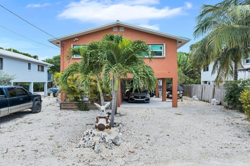 Welcome to 71 Dorsett Dr.  This 3 bedroom / 2 bath concrete home - Beach Home for sale in Marathon, Florida on Beachhouse.com