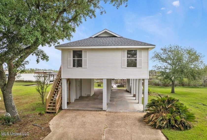 Welcome to your new coastal retreat! This beautifully renovated - Beach Home for sale in Pass Christian, Mississippi on Beachhouse.com