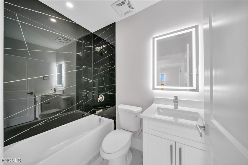 Welcome to this charming 3-bedroom, 2-bath home designed for - Beach Home for sale in Lehigh Acres, Florida on Beachhouse.com