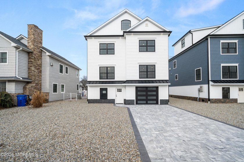 The epitome of a modern coastal New Construction waterfront home - Beach Home for sale in Toms River, New Jersey on Beachhouse.com