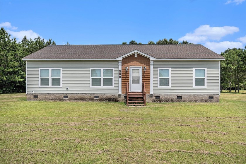 Enjoy the freedom of no HOA on this spacious 1-acre property in - Beach Home for sale in Longs, South Carolina on Beachhouse.com