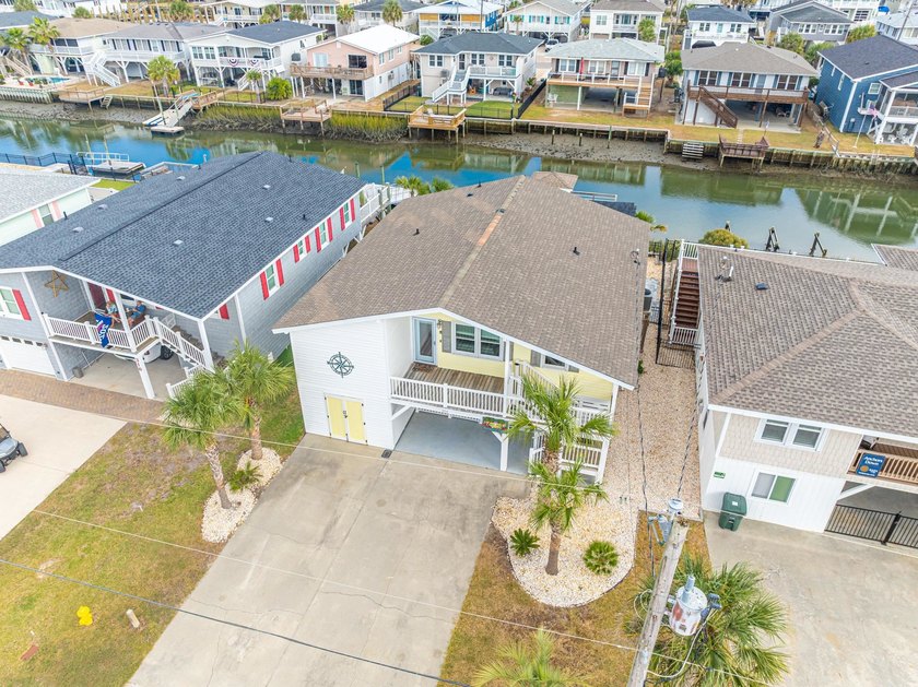 Welcome to Paradise Palms, a beautifully elevated channel-front - Beach Home for sale in North Myrtle Beach, South Carolina on Beachhouse.com