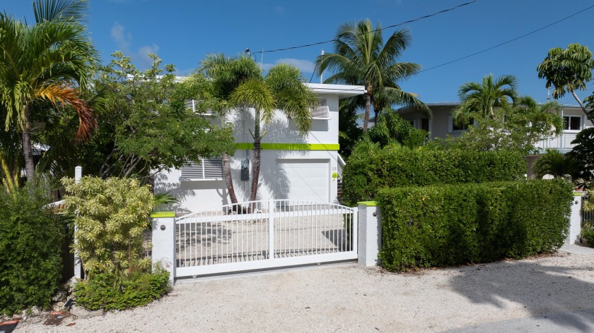 Nestled on a quiet street in the heart of Plantation Key, this - Beach Home for sale in Plantation Key, Florida on Beachhouse.com