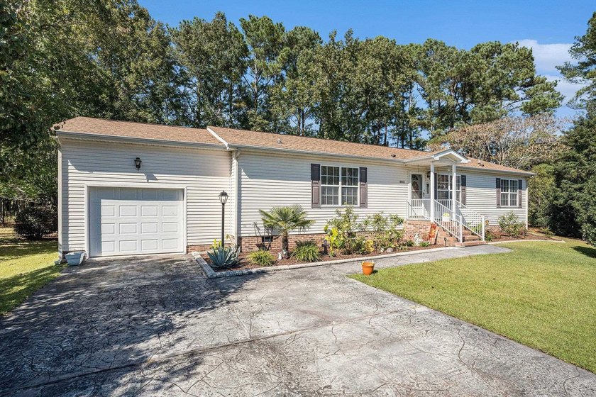 Welcome to relaxed lakefront living in the desirable 55+ gated - Beach Home for sale in Little River, South Carolina on Beachhouse.com