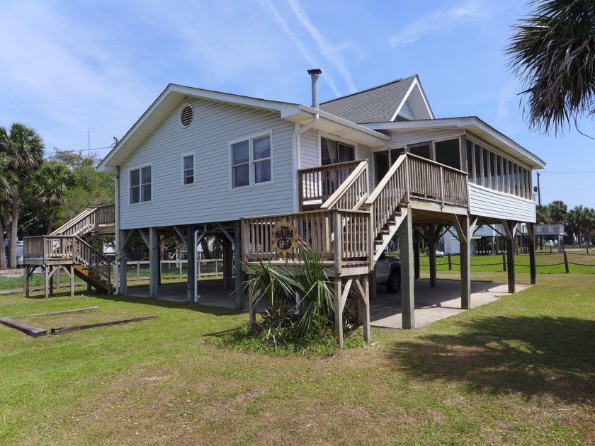 Casual beach cottage 3rd row from the beach offering OCEAN VIEWS - Beach Home for sale in Edisto Island, South Carolina on Beachhouse.com