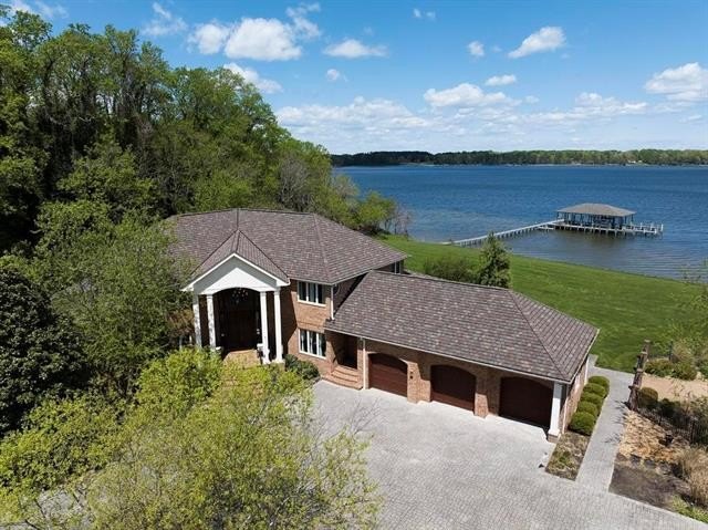Privately set on 12 acres high above the Piankatank River, this - Beach Home for sale in Cobbs Creek, Virginia on Beachhouse.com