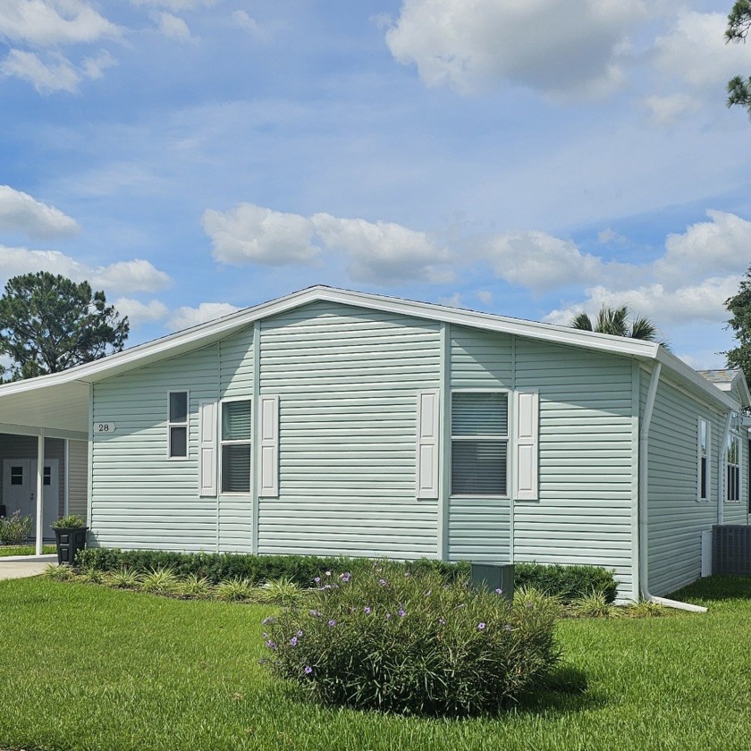 Outstanding, open concept lakefront home has just been - Beach Home for sale in Ormond Beach, Florida on Beachhouse.com