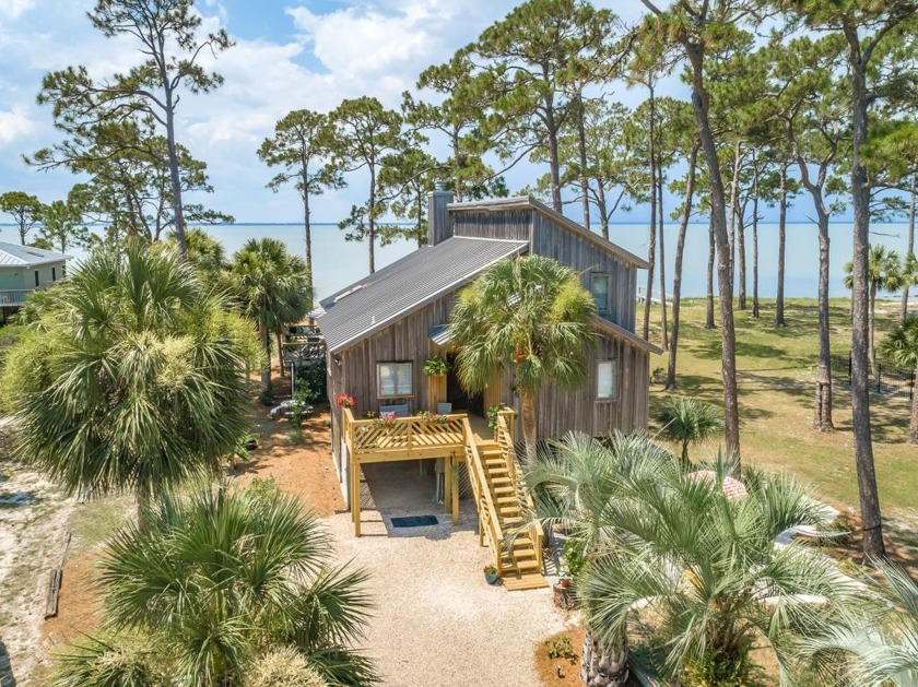 Peaceful Bayfront home with community dock and pool! Water's - Beach Home for sale in St. George Island, Florida on Beachhouse.com