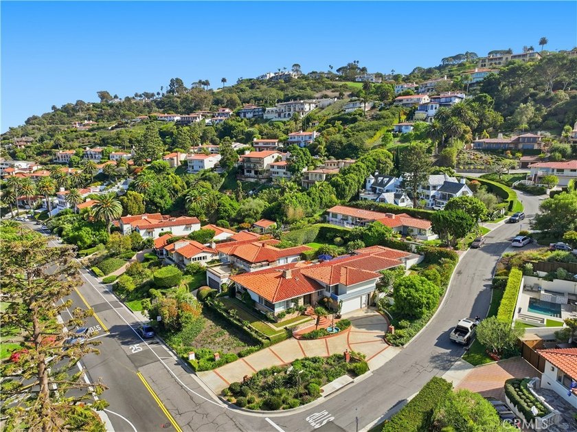 Perched on the corner of Via Conejo and Via del Monte, this - Beach Home for sale in Palos Verdes Estates, California on Beachhouse.com