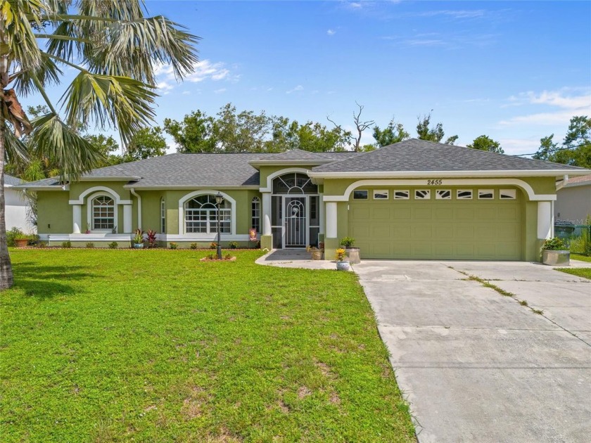 SPACIOUS 3 BEDROOM, 2 BATH, 2-CAR GARAGE CANAL FRONT POOL HOME - Beach Home for sale in North Port, Florida on Beachhouse.com