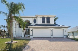 Do not miss this BEAUTIFUL 2 Story Home. 4-Bedrooms & - Beach Home for sale in Cape Coral, Florida on Beachhouse.com