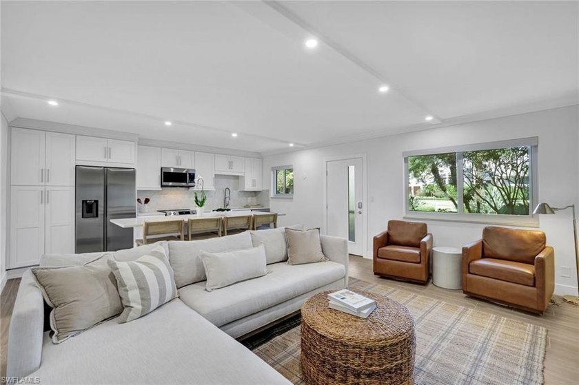 Beautifully remodeled and meticulously maintained end-unit, this - Beach Condo for sale in Naples, Florida on Beachhouse.com