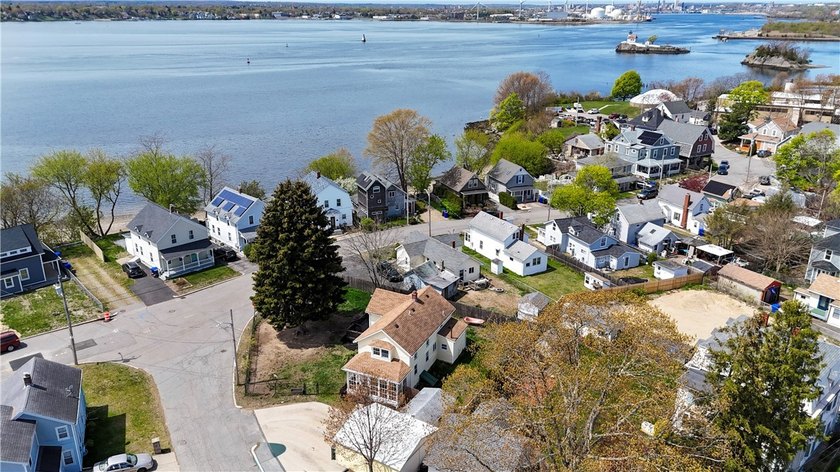 Set along the water with desirable west-facing exposure, this - Beach Home for sale in East Providence, Rhode Island on Beachhouse.com