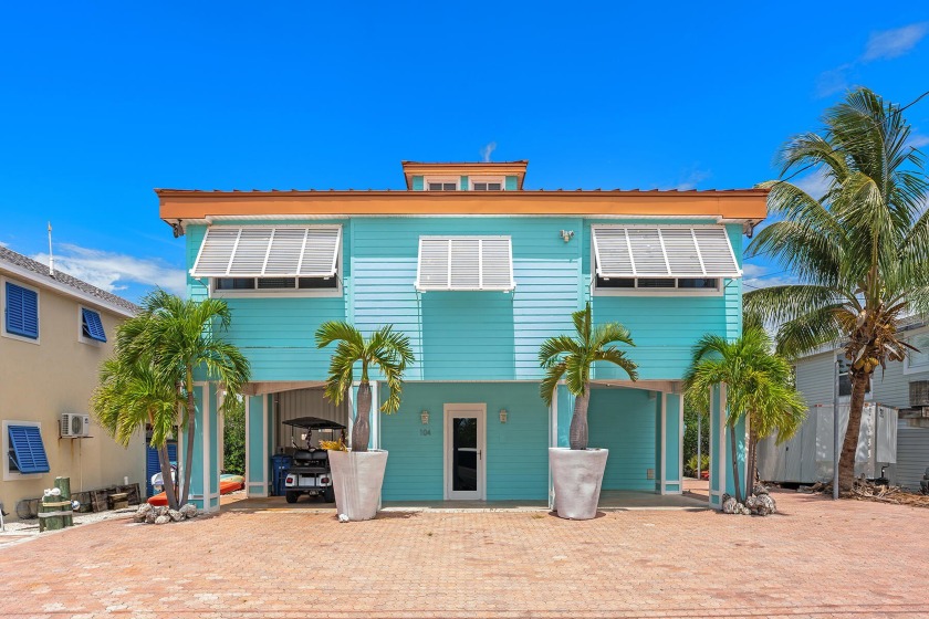 INVESTORS! Experience this exquisitely renovated waterfront - Beach Home for sale in Long Key, Florida on Beachhouse.com