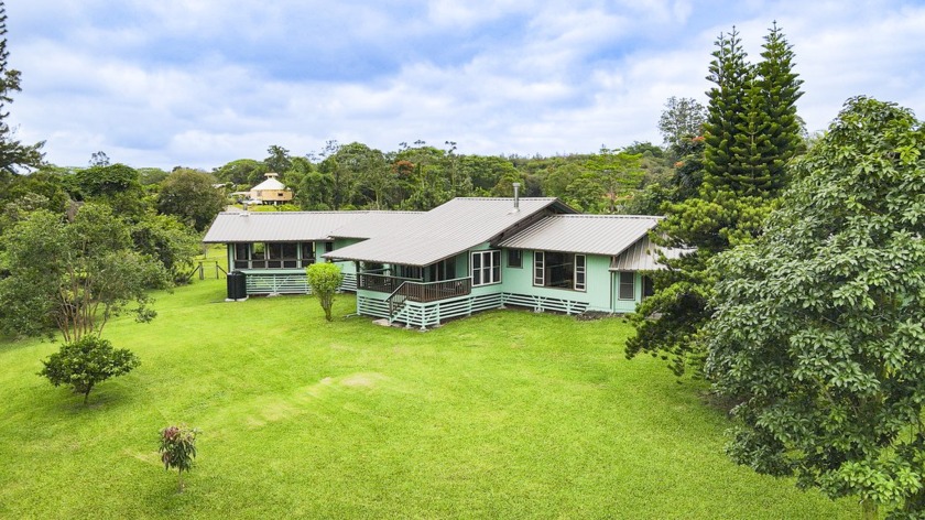 Discover your dream country estate in Waiakea Uka, nestled on a - Beach Home for sale in Hilo, Hawaii on Beachhouse.com