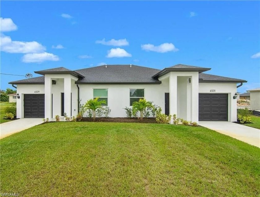 BEAUTIFUL NEWLY CONSTRUCTION DUPLEX. Live in one side and use - Beach Townhome/Townhouse for sale in Lehigh Acres, Florida on Beachhouse.com
