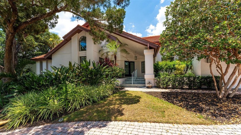 A rare opportunity to secure a residence in the Bay Isles Bayou - Beach Home for sale in Longboat Key, Florida on Beachhouse.com