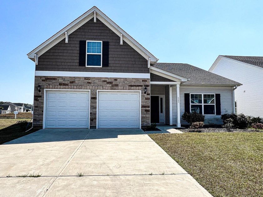This beautifully designed 1.5-story home offers 3 bedrooms and 3 - Beach Home for sale in Myrtle Beach, South Carolina on Beachhouse.com