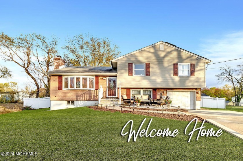 Welcome to this well maintained split-level nestled on a quiet - Beach Home for sale in Neptune, New Jersey on Beachhouse.com