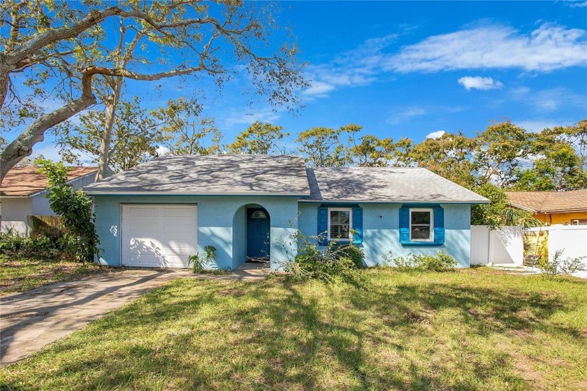 Welcome to this charming 3-bedroom, 2-bathroom home located in - Beach Home for sale in Largo, Florida on Beachhouse.com