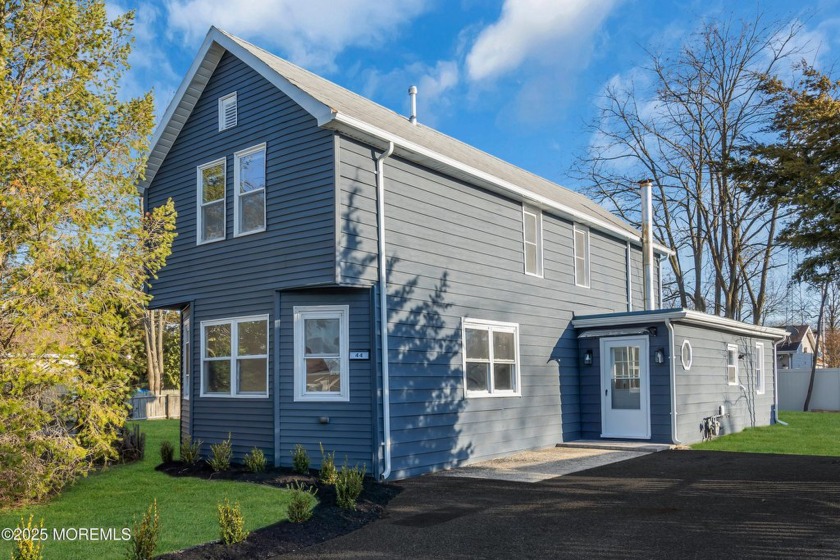 Welcome to this completely remodeled 3-bed, 2-bath home offering - Beach Home for sale in Ocean Gate, New Jersey on Beachhouse.com