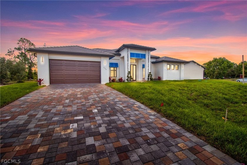 Modern Elegance with a Colonial Touch! Welcome to your dream - Beach Home for sale in Lehigh Acres, Florida on Beachhouse.com