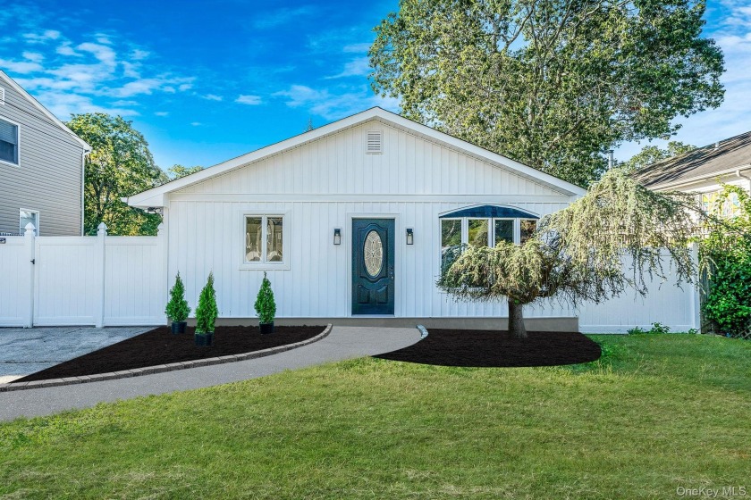 Welcome to this updated sun-filled 3 bedroom, 1 bath ranch - Beach Home for sale in Mastic Beach, New York on Beachhouse.com