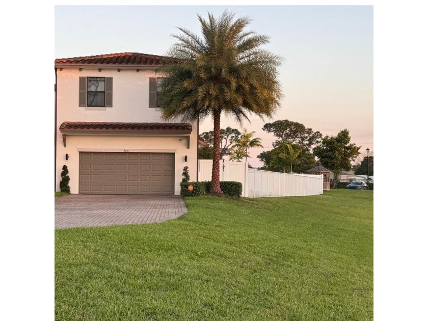 Welcome to a beautifully upgraded waterfront property situated - Beach Home for sale in Riviera Beach, Florida on Beachhouse.com