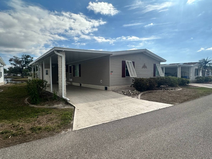 This meticulously maintained, fully furnished 2-bedroom home - Beach Home for sale in Punta Gorda, Florida on Beachhouse.com