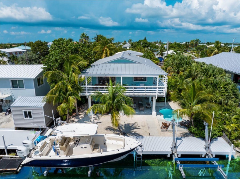 Idyllic Breezeswept Beach Estates, Canal-Front home offering - Beach Home for sale in Ramrod Key, Florida on Beachhouse.com