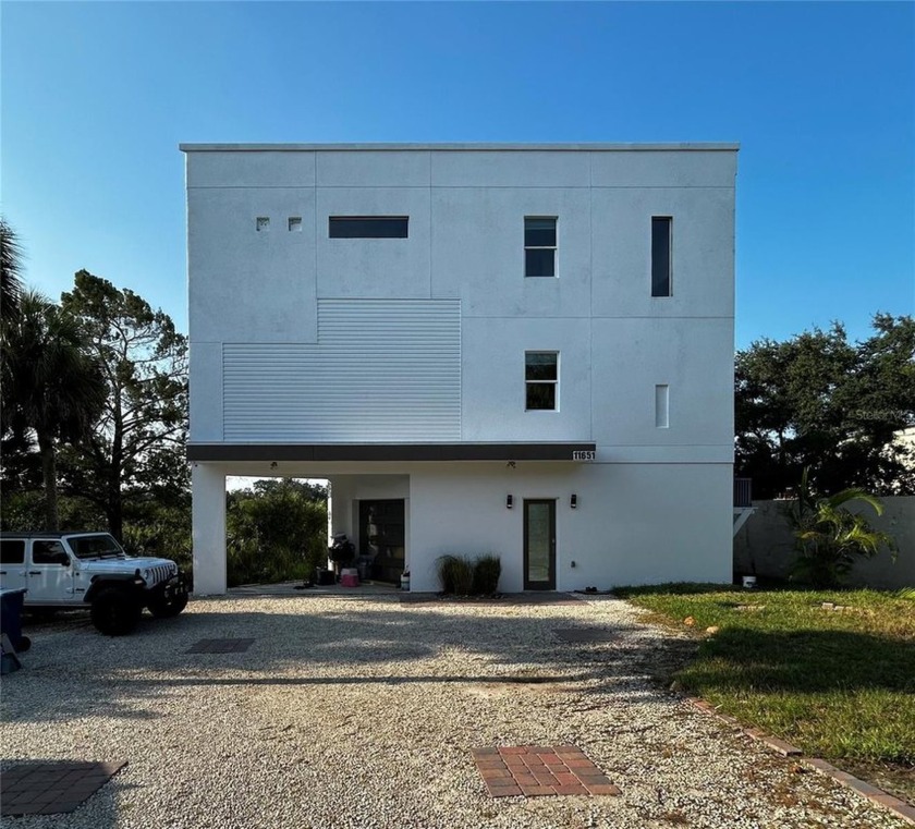 210' of Manatee River Front 3 Story home built in 2022.  Modern - Beach Home for sale in Bradenton, Florida on Beachhouse.com